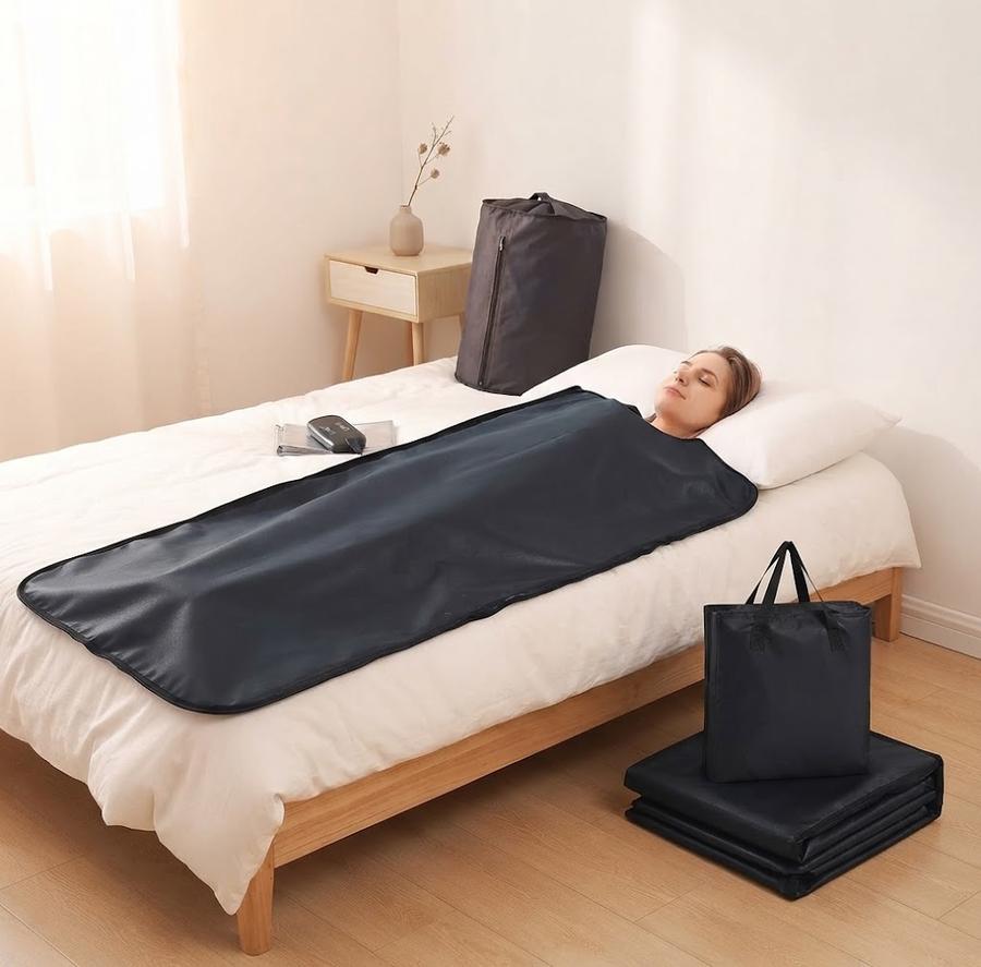 Infrared Sauna Blanket, PU Leather Black set up in a home room